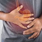 A man holding his stomach