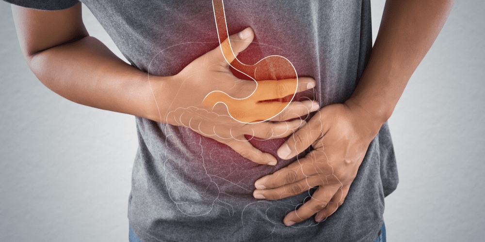 A man holding his stomach